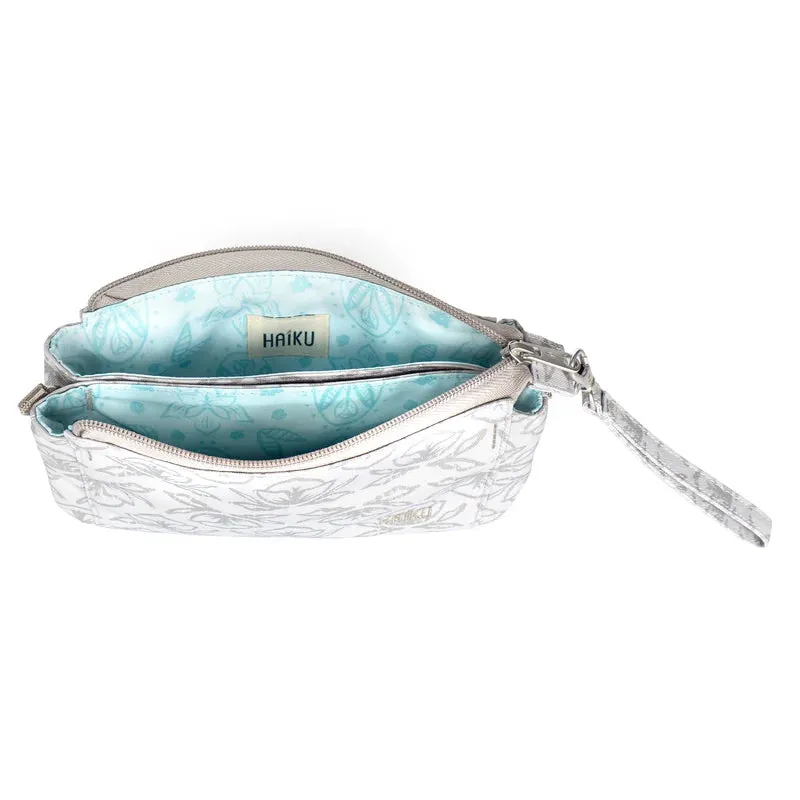 Haiku Revel Crossbody Bag in Stone Gray, Forest, River Rock Blue, Cherry Blossom & Black