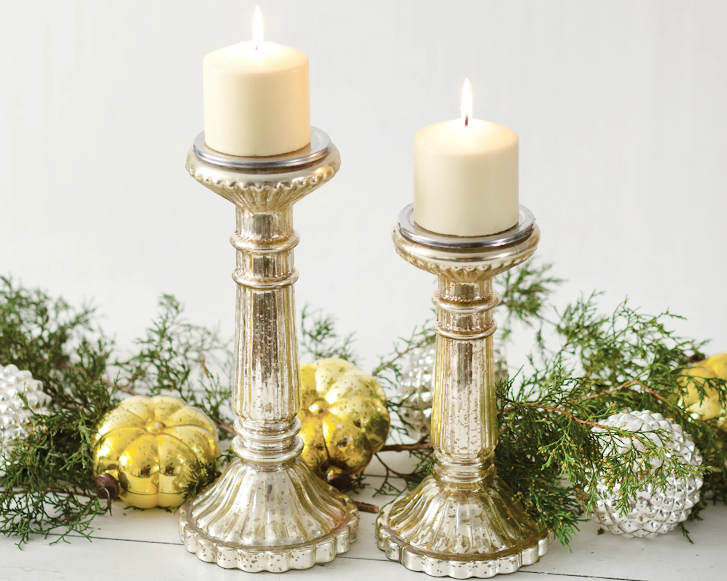 Set of mercury glass pillar candle holders